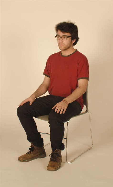 guy sitting on a chair