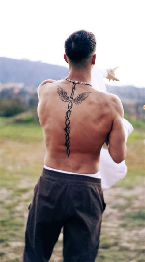 Guy Spine Tattoos