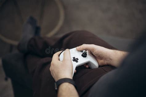 Guy holding game controller