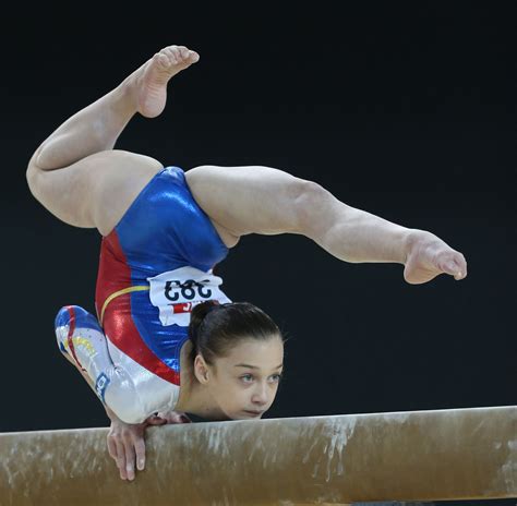 gymnastics poses on beam