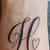 h letter tattoo on hand