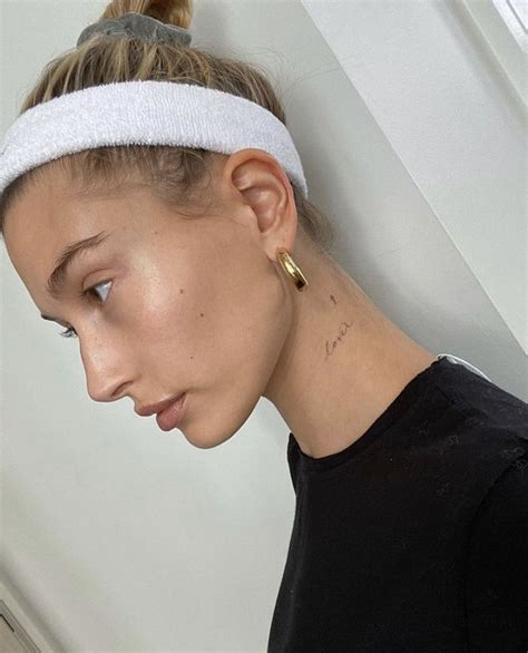 The Meaning Behind Hailey Bieber's Hip Tattoos