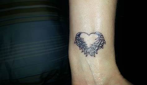 Angel wing tattoo with heart. Wing tattoo. Heart tattoo. Memorial