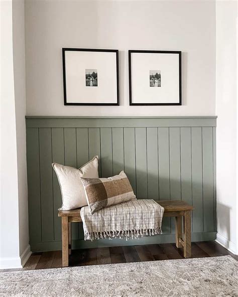 Bedroom with half painted wall in different shades of