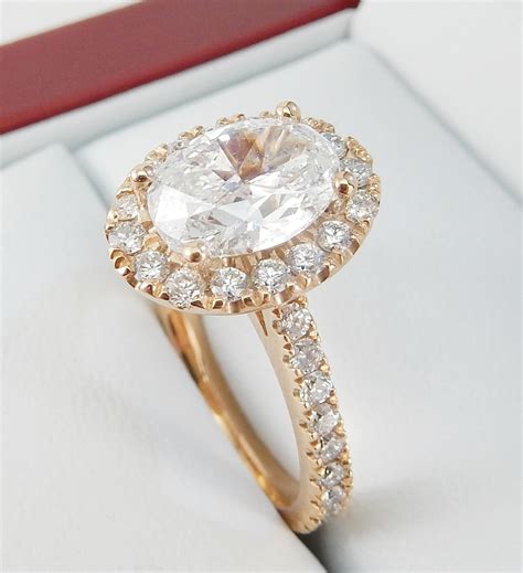 halo oval engagement rings rose gold
