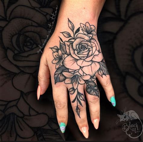 +21 Hand Tattoos Flower Designs Ideas