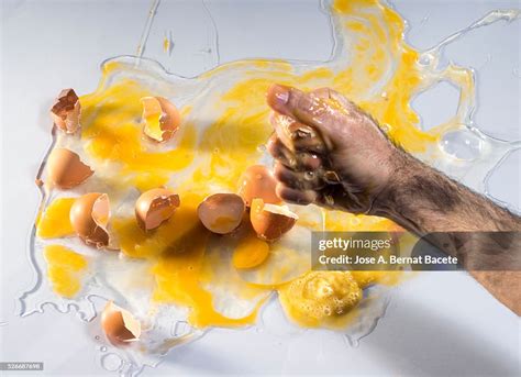 Hand Crushing Egg