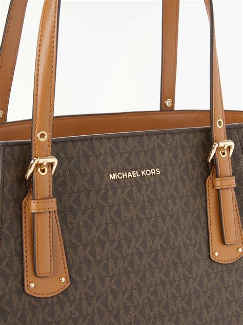 handbags mk on sale large voyager