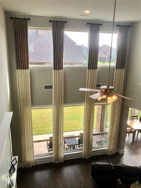 hanging curtains in a room with high ceilings