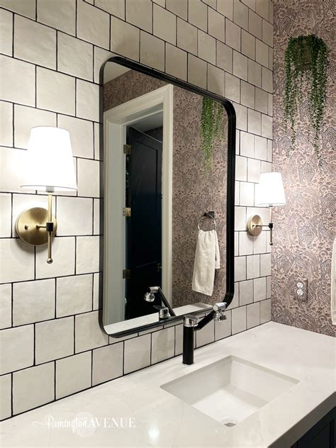 Hanging Mirror On Tile Wall