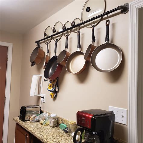 Hanging Pans On Kitchen Wall