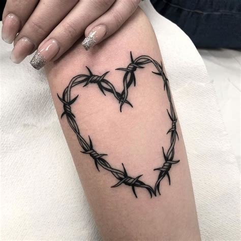 heart with barbed wire tattoo