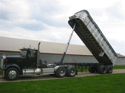 height of dump truck with bed raised
