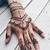 henna hand finger tattoo