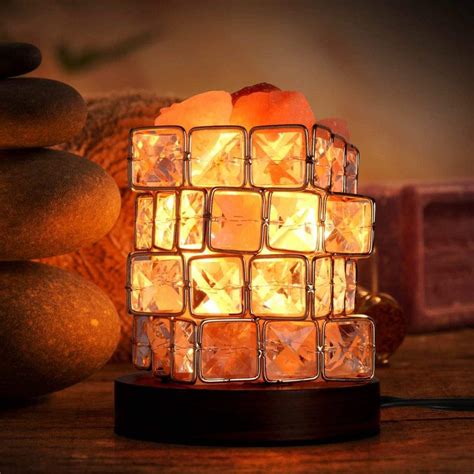 himalayan salt lamps in decorative containers