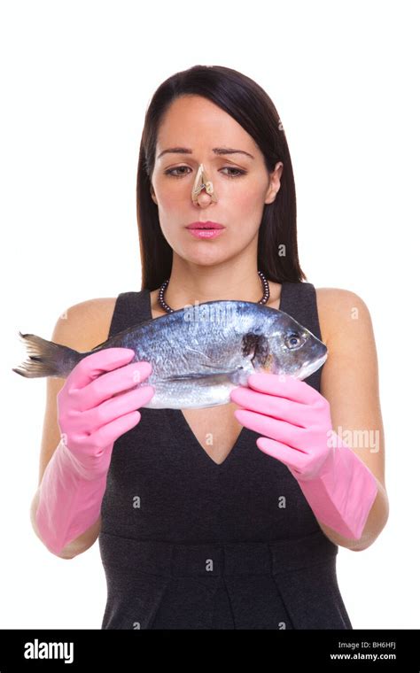 Holding Fish With Gloves