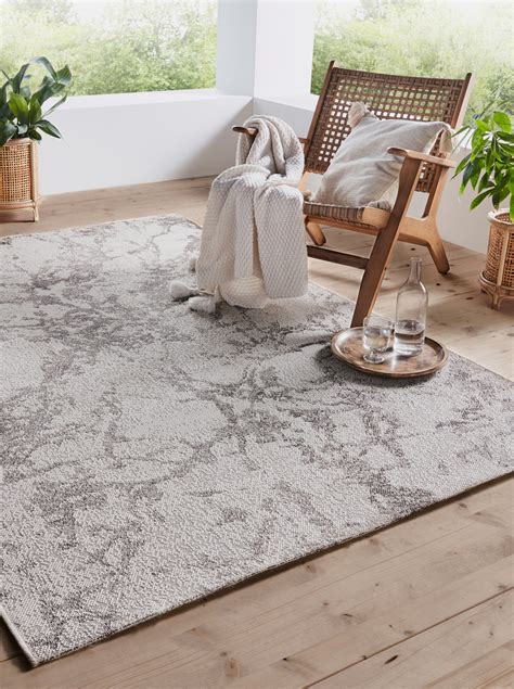 KurzflorTeppich EthnoMuster Schwarz Weiß Modern und mit markantem