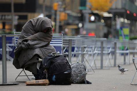 Homeless Person Using a Computer