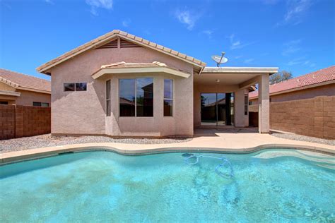 homes for sale with pool near me under 300k