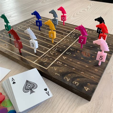 horse board game with dice and cards