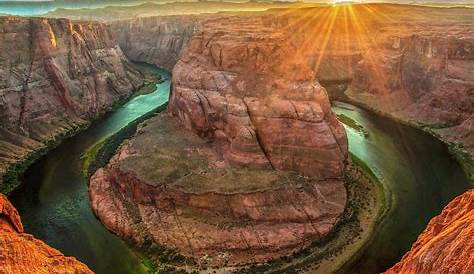 Horseshoe Bend Sunrise Photos At The Edge Of A Photograph By