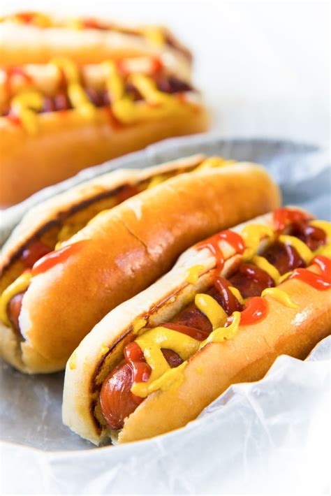 hot dog buns and hot dogs