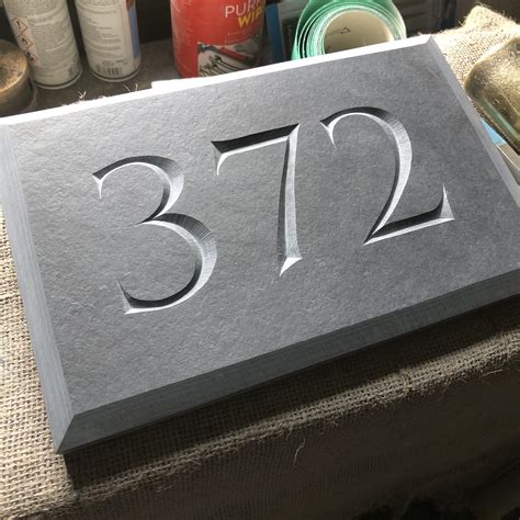 house numbers on stone