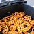 how long to cook frozen curly fries in air fryer