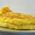 how should a cook beat eggs for an omelet