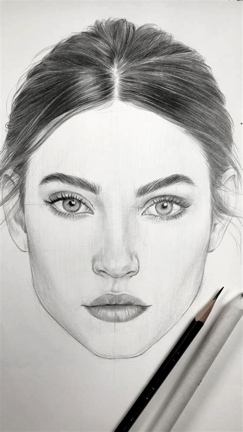 Drawing a minimalistic face with graphite pencils