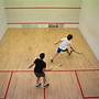 how to play squash ball