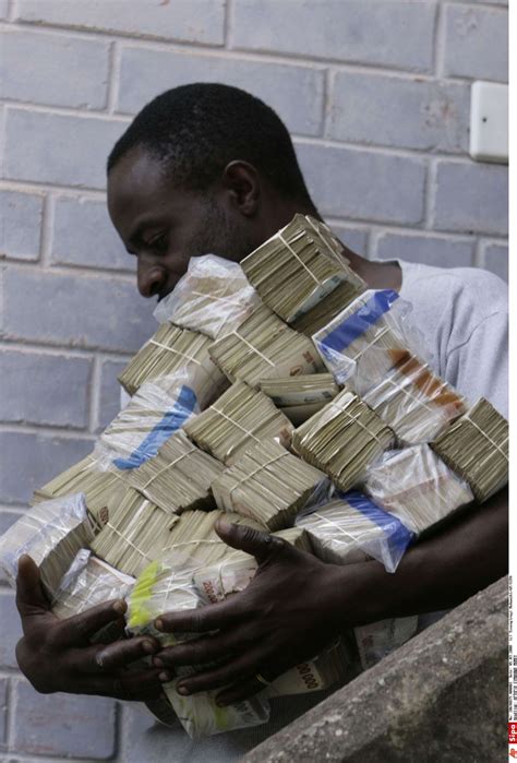 how did zimbabwe fix hyperinflation