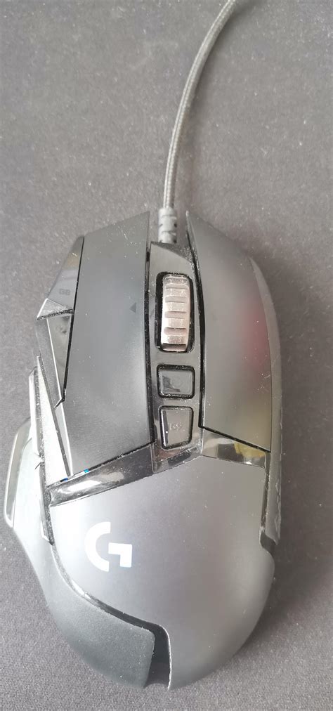how do i fix the scroll wheel on the g502