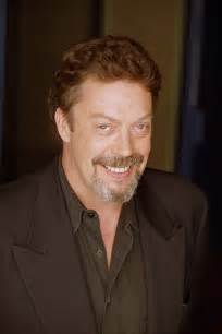 how is tim curry