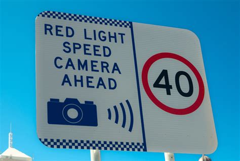 how many demerit points is a red light speed camera