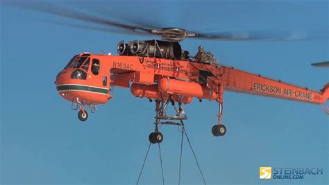 how much can a huey helicopter lift