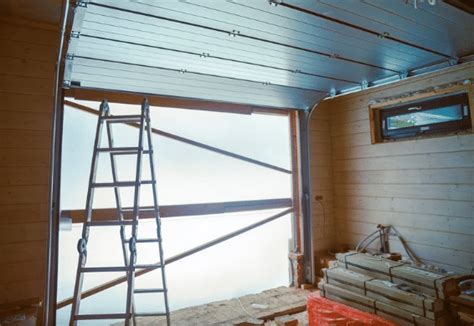 How Much Does It Cost To Replace The Rollers On A Garage Door