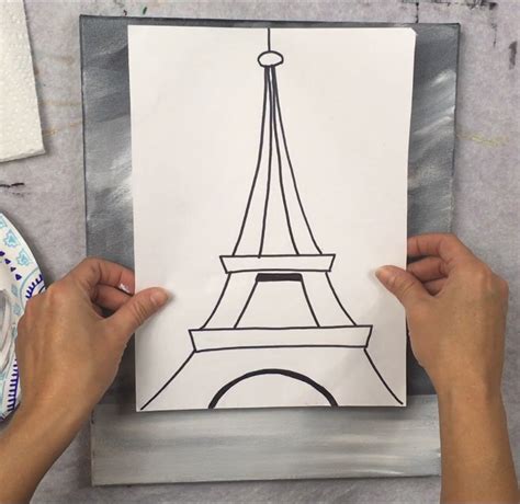 how much paint does it take to paint the eiffel tower