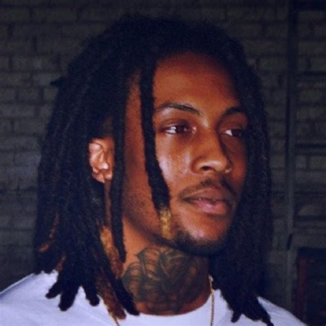how old is chris travis