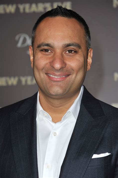 how old is russell peters