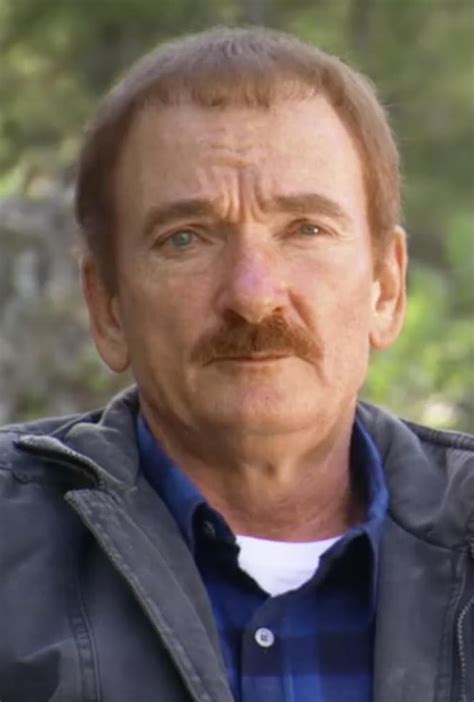 how old is travis walton