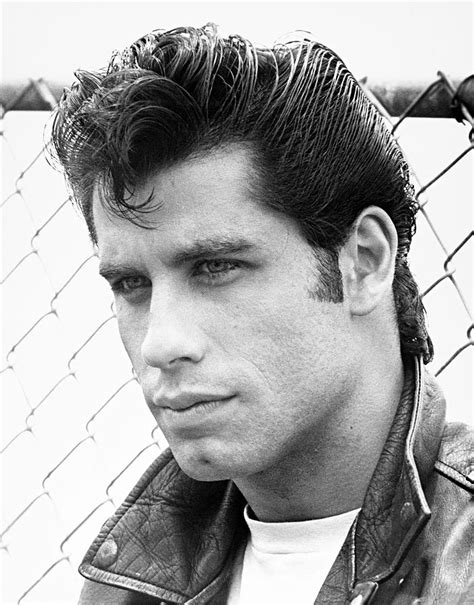 how old was john travolta when he made grease