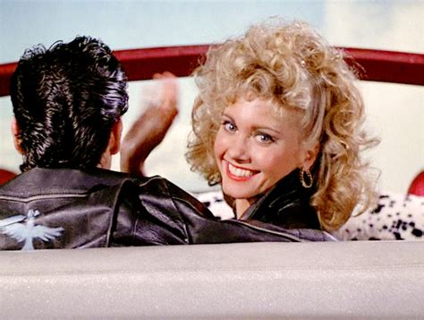 how old were olivia newton john in grease
