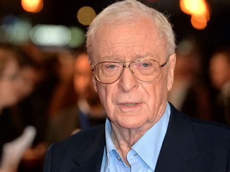 how tall is michael caine in feet