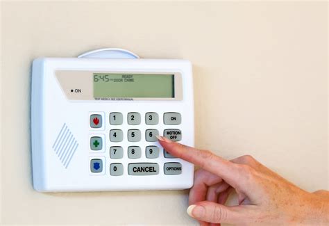 how to change battery in guardian alarm panel