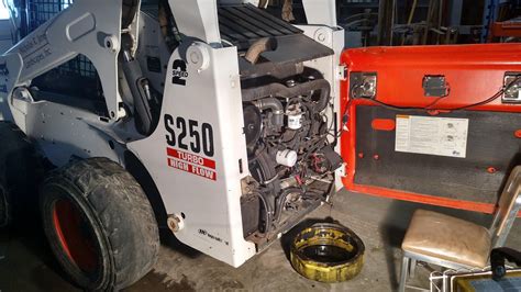 how to change hydraulic oil bobcat 753