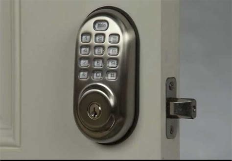 how to change the code on a yale push button door lock