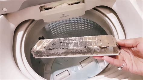 how to clean a top loading washing machine with an agitator