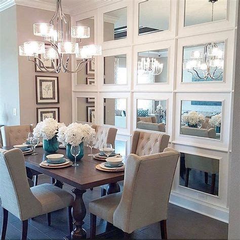 Large wall art is modern and dramatic in this beautiful dining room 
