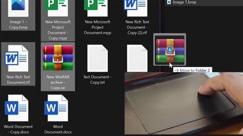 how to drag a file in laptop without mouse